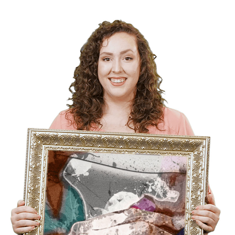 art education student holding ornate frame